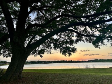 Welcome to your dream retreat! Savor the 180? sunset view every on Palisades Country Club in Florida - for sale on GolfHomes.com, golf home, golf lot
