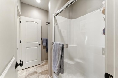 Step into luxury with this stunning reverse 1 1/2 -story home on Prairie Highlands Golf Course in Kansas - for sale on GolfHomes.com, golf home, golf lot