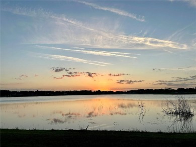 Welcome to your dream retreat! Savor the 180? sunset view every on Palisades Country Club in Florida - for sale on GolfHomes.com, golf home, golf lot