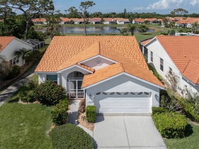 TRANQUILITY MEETS ELEGANCE WITH PICTURESQUE WATER VIEWS! Welcome on Venice East Golf Club in Florida - for sale on GolfHomes.com, golf home, golf lot