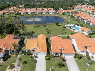 TRANQUILITY MEETS ELEGANCE WITH PICTURESQUE WATER VIEWS! Welcome on Venice East Golf Club in Florida - for sale on GolfHomes.com, golf home, golf lot