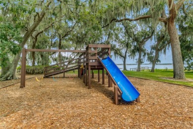 Welcome to your dream retreat! Savor the 180? sunset view every on Palisades Country Club in Florida - for sale on GolfHomes.com, golf home, golf lot