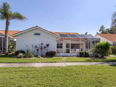 TRANQUILITY MEETS ELEGANCE WITH PICTURESQUE WATER VIEWS! Welcome on Venice East Golf Club in Florida - for sale on GolfHomes.com, golf home, golf lot