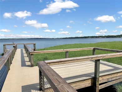 Welcome to your dream retreat! Savor the 180? sunset view every on Palisades Country Club in Florida - for sale on GolfHomes.com, golf home, golf lot