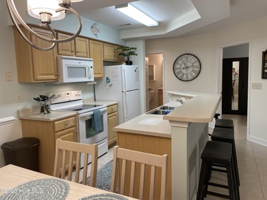Beautifully updated, FIRST FLOOR, 2BR/2BA condo in the desirable on Brunswick Plantation and Golf Resorts in North Carolina - for sale on GolfHomes.com, golf home, golf lot