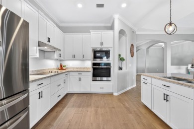 Situated along the picturesque 16th fairway of the acclaimed on Heritage Landing Golf  in Florida - for sale on GolfHomes.com, golf home, golf lot