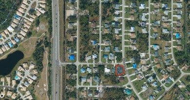 Picture building your own Florida Dream Home on this corner lot! on Oyster Creek Golf Club in Florida - for sale on GolfHomes.com, golf home, golf lot