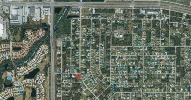 Picture building your own Florida Dream Home on this corner lot! on Oyster Creek Golf Club in Florida - for sale on GolfHomes.com, golf home, golf lot