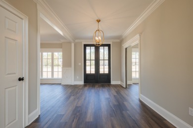 New Construction located in the premier golf course community of on Kinderlou Forest Golf Club in Georgia - for sale on GolfHomes.com, golf home, golf lot