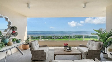 This rarely available 5th-floor Cayman residence in Grand Bay I on Longboat Key Golf Club Resort in Florida - for sale on GolfHomes.com, golf home, golf lot