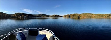 Discover your private woodland retreat with seasonal long-range on The Highlands Course at Lake Arrowhead in Georgia - for sale on GolfHomes.com, golf home, golf lot