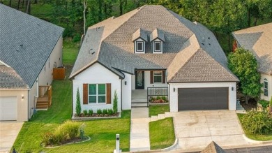 Stunning new construction in a gated golf community. This home on Heritage Hills Golf Course in Oklahoma - for sale on GolfHomes.com, golf home, golf lot