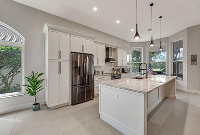 This beautiful open concept renovated home is one you will not on Fountains Golf and Country Club in Florida - for sale on GolfHomes.com, golf home, golf lot