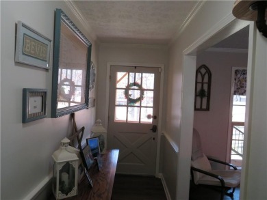 Sprawling brick ranch over full basement located in great area on Cherokee Golf and Country Club in Georgia - for sale on GolfHomes.com, golf home, golf lot