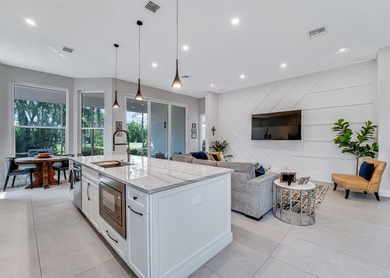 This beautiful open concept renovated home is one you will not on Fountains Golf and Country Club in Florida - for sale on GolfHomes.com, golf home, golf lot