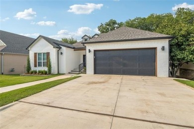 Stunning new construction in a gated golf community. This home on Heritage Hills Golf Course in Oklahoma - for sale on GolfHomes.com, golf home, golf lot