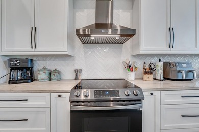 This beautiful open concept renovated home is one you will not on Fountains Golf and Country Club in Florida - for sale on GolfHomes.com, golf home, golf lot