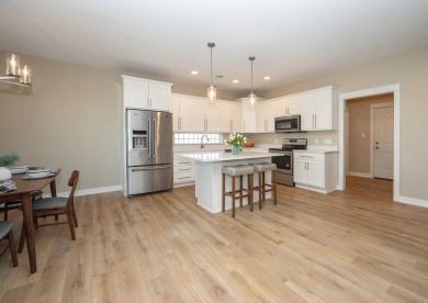 Fall in love with this stand alone, like new condo in Prairie on Centennial Oaks Golf Club in Iowa - for sale on GolfHomes.com, golf home, golf lot