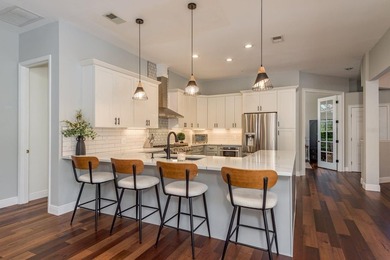 Welcome to this beautifully remodeled brick estate nestled on a on East Lake Woodlands Country Club in Florida - for sale on GolfHomes.com, golf home, golf lot
