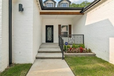 Stunning new construction in a gated golf community. This home on Heritage Hills Golf Course in Oklahoma - for sale on GolfHomes.com, golf home, golf lot