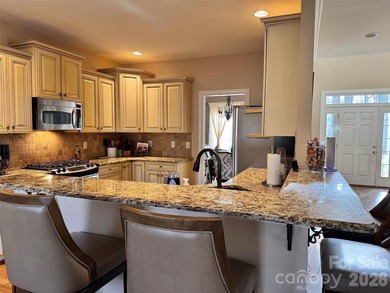 This elegant residence welcomes you with an impressive open on The Divide Golf Club in North Carolina - for sale on GolfHomes.com, golf home, golf lot