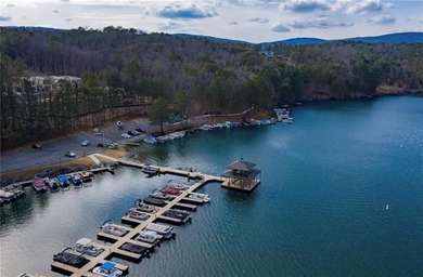 Discover your private woodland retreat with seasonal long-range on The Highlands Course at Lake Arrowhead in Georgia - for sale on GolfHomes.com, golf home, golf lot