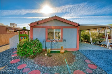 Charming 2-bedroom home featuring a split floor plan and an on The Refuge Golf and Country Club in Arizona - for sale on GolfHomes.com, golf home, golf lot