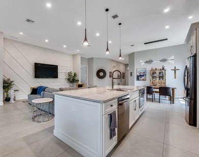 This beautiful open concept renovated home is one you will not on Fountains Golf and Country Club in Florida - for sale on GolfHomes.com, golf home, golf lot