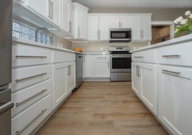 Fall in love with this stand alone, like new condo in Prairie on Centennial Oaks Golf Club in Iowa - for sale on GolfHomes.com, golf home, golf lot