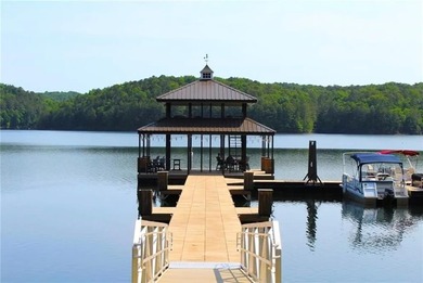 Discover your private woodland retreat with seasonal long-range on The Highlands Course at Lake Arrowhead in Georgia - for sale on GolfHomes.com, golf home, golf lot