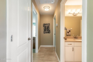 Large Contemporary 3 bedroom, 2 ,5 bath residence in highly on The Golf Club At Cypress Head in Florida - for sale on GolfHomes.com, golf home, golf lot