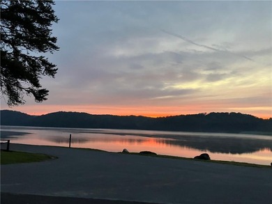 Discover your private woodland retreat with seasonal long-range on The Highlands Course at Lake Arrowhead in Georgia - for sale on GolfHomes.com, golf home, golf lot