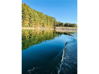 Discover your private woodland retreat with seasonal long-range on The Highlands Course at Lake Arrowhead in Georgia - for sale on GolfHomes.com, golf home, golf lot