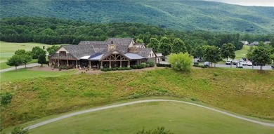 Discover your private woodland retreat with seasonal long-range on The Highlands Course at Lake Arrowhead in Georgia - for sale on GolfHomes.com, golf home, golf lot