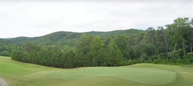 Discover your private woodland retreat with seasonal long-range on The Highlands Course at Lake Arrowhead in Georgia - for sale on GolfHomes.com, golf home, golf lot