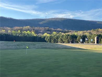 Discover your private woodland retreat with seasonal long-range on The Highlands Course at Lake Arrowhead in Georgia - for sale on GolfHomes.com, golf home, golf lot