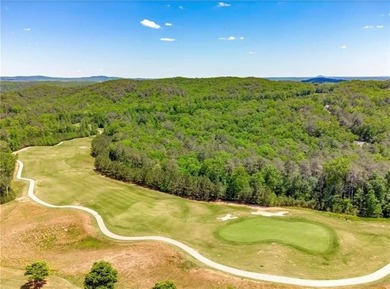 Discover your private woodland retreat with seasonal long-range on The Highlands Course at Lake Arrowhead in Georgia - for sale on GolfHomes.com, golf home, golf lot
