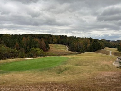 Discover your private woodland retreat with seasonal long-range on The Highlands Course at Lake Arrowhead in Georgia - for sale on GolfHomes.com, golf home, golf lot