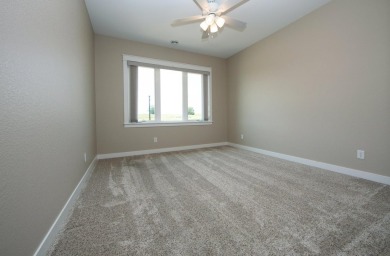 Fall in love with this stand alone, like new condo in Prairie on Centennial Oaks Golf Club in Iowa - for sale on GolfHomes.com, golf home, golf lot