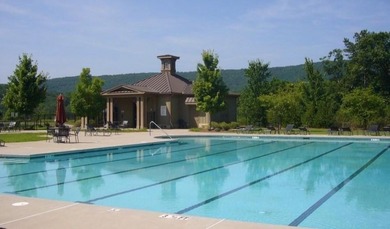 Discover your private woodland retreat with seasonal long-range on The Highlands Course at Lake Arrowhead in Georgia - for sale on GolfHomes.com, golf home, golf lot