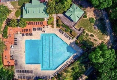 Discover your private woodland retreat with seasonal long-range on The Highlands Course at Lake Arrowhead in Georgia - for sale on GolfHomes.com, golf home, golf lot