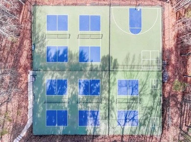 Discover your private woodland retreat with seasonal long-range on The Highlands Course at Lake Arrowhead in Georgia - for sale on GolfHomes.com, golf home, golf lot