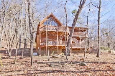 This beautiful, meticulously maintained log home sits on .95 on Bent Tree Golf Course in Georgia - for sale on GolfHomes.com, golf home, golf lot