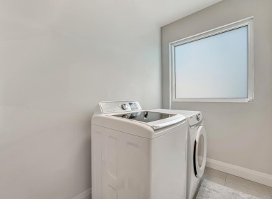 This beautiful open concept renovated home is one you will not on Fountains Golf and Country Club in Florida - for sale on GolfHomes.com, golf home, golf lot
