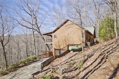 This beautiful, meticulously maintained log home sits on .95 on Bent Tree Golf Course in Georgia - for sale on GolfHomes.com, golf home, golf lot