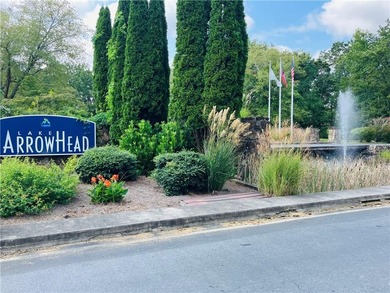 Discover your private woodland retreat with seasonal long-range on The Highlands Course at Lake Arrowhead in Georgia - for sale on GolfHomes.com, golf home, golf lot