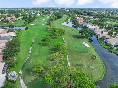 This beautiful open concept renovated home is one you will not on Fountains Golf and Country Club in Florida - for sale on GolfHomes.com, golf home, golf lot