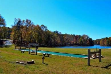 This beautiful, meticulously maintained log home sits on .95 on Bent Tree Golf Course in Georgia - for sale on GolfHomes.com, golf home, golf lot