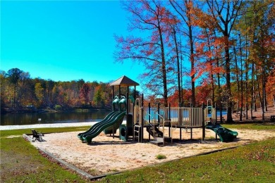 This beautiful, meticulously maintained log home sits on .95 on Bent Tree Golf Course in Georgia - for sale on GolfHomes.com, golf home, golf lot