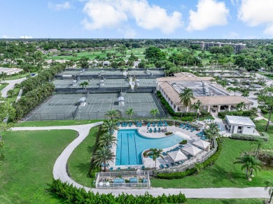 This beautiful open concept renovated home is one you will not on Fountains Golf and Country Club in Florida - for sale on GolfHomes.com, golf home, golf lot